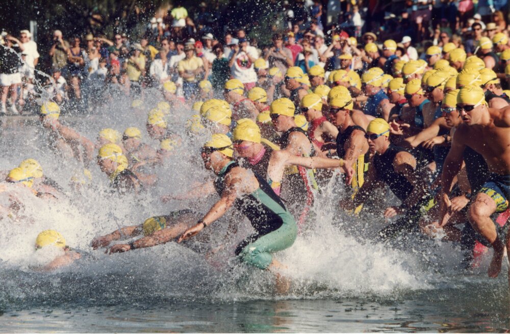 Competitors, swim leg, Noosa Triathlon, Noosa Heads, 1980s
