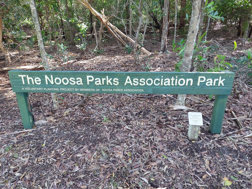 'The Noosa Park Association Park' sign, off Claude Batten Drive, Noosa Heads, 14 June 2025