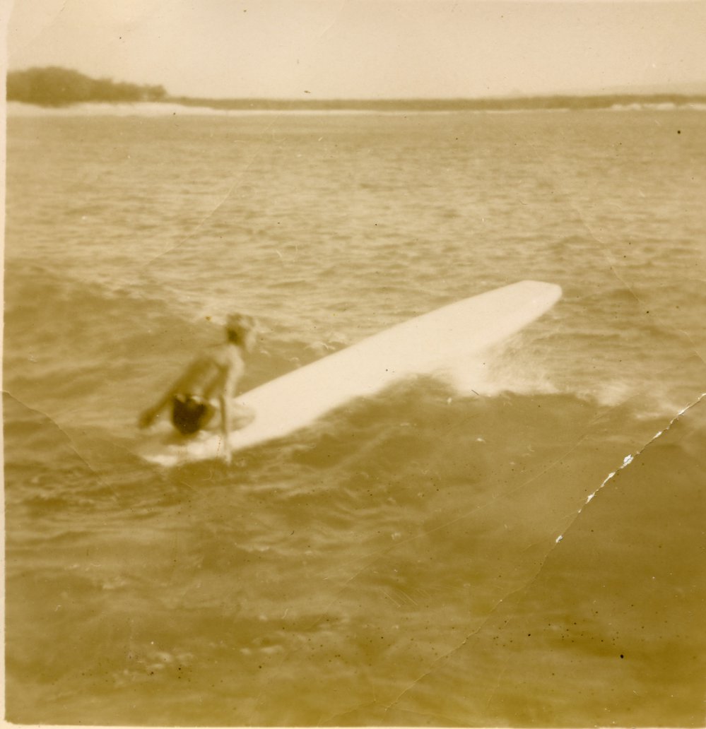 Kevin Freeman on surfboard 'Dolphin', Noosa Heads, 26 June 1948 
