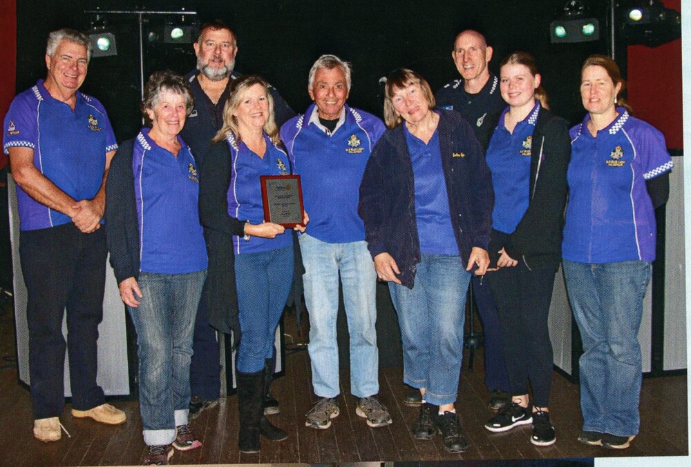 Sergeant Mal Scott (3rd left), unknown police officer (3rd right) and Blue Light Disco volunteers, Cooroy Memorial Hall, Cooroy, ca 2020
