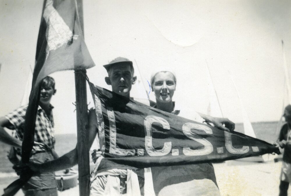 Ken and Laureen, Lake Cootharaba Sailing Club burgee, ca 1950s