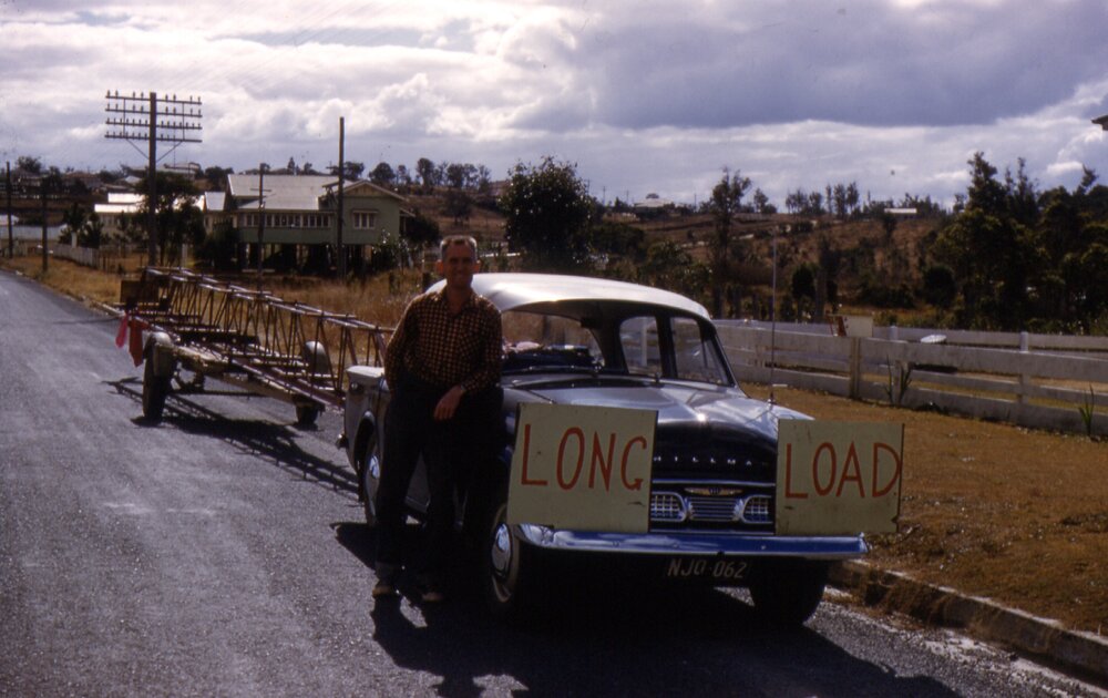 A long load, Clubhouse construction, Lake Cootharaba Sailing Club members, ca 1960