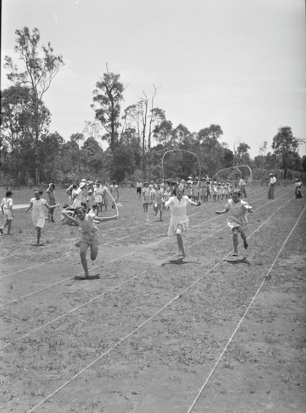 Skipping race participants, Sports Carnival, Cooroy State School, Cooroy, 1950