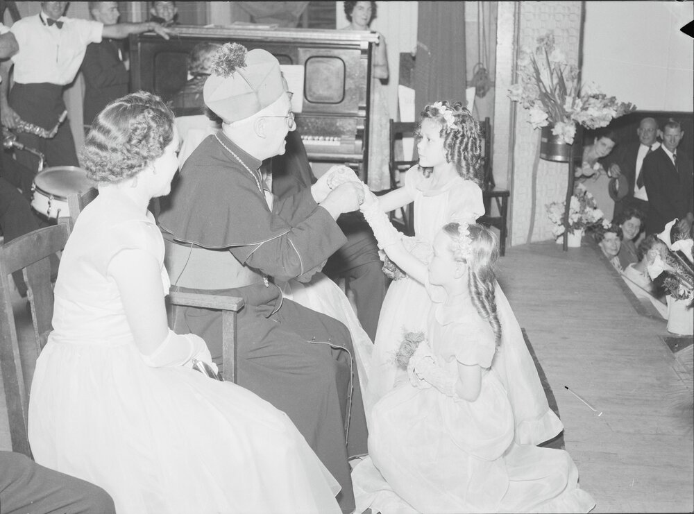 Presented to the Bishop, Roman Catholic Debutante Ball, Cooroy Memorial Hall, Maple Street, Cooroy, 1956