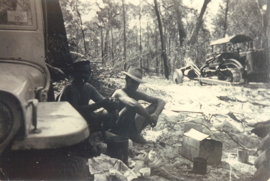 Lunch break, timbergetters Selwyn Beckmann with Ray Gibson, Noosa River, Cooloola, 1950s