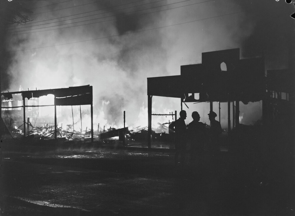 Fire underway, Godber's Drapers, Poinciana Avenue, Tewantin, 1956