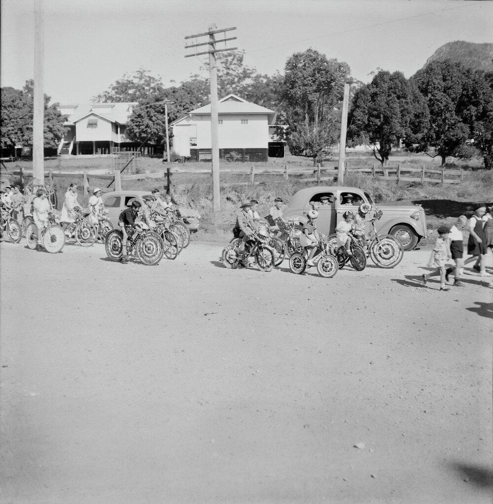 Decorated bikes, Coronation Day parade, Reserve Street, Pomona, 2 June 1953