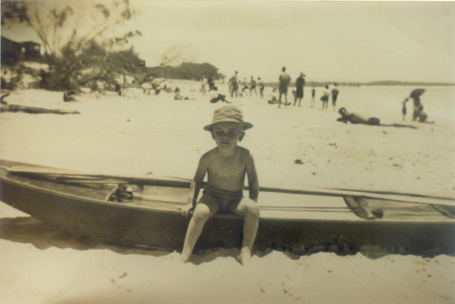 Barry Tedford (child) and beachgoers, Noosa Main Beach, Noosa Heads, 1947-1948