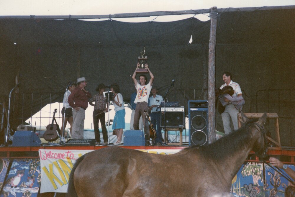 Gavin Elliott with trophy, Great Kin Kin Horse Race, Kin Kin, ca 1986-88