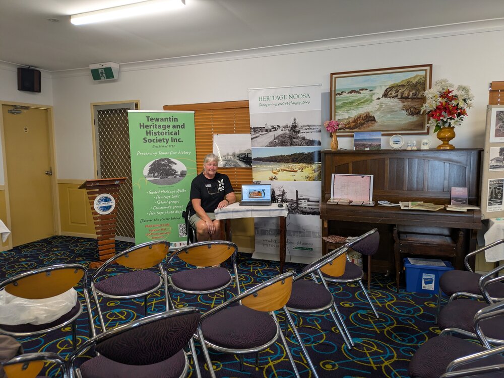 Helen Grice with Heritage Noosa display, 'Celebrating Parkyn's Hut 25th Anniversary,' Tewantin, 13 June 2026