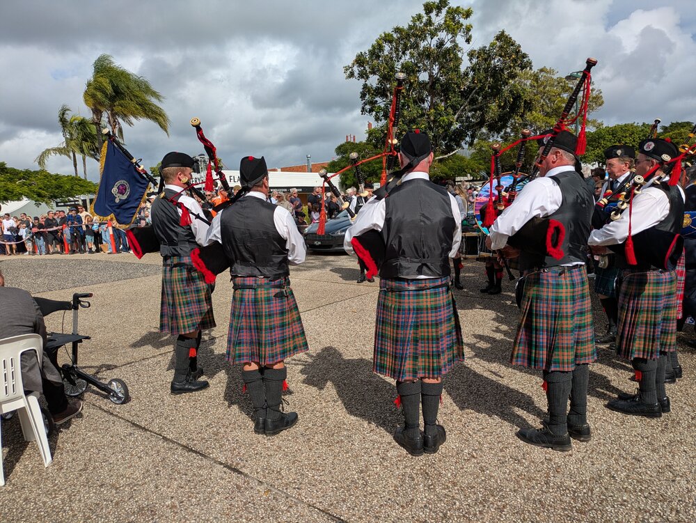 Band members, Noosa &amp; District Pipe Band, ANZAC Day parade, Tewantin, 25 April 2026