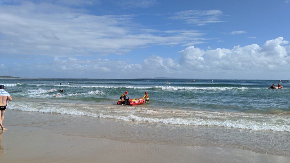 Competitors and Noosa Surf Lifesavers, Noosa Summer Swim Festival, Noosa Main Beach, Noosa Heads, 23 February 2025