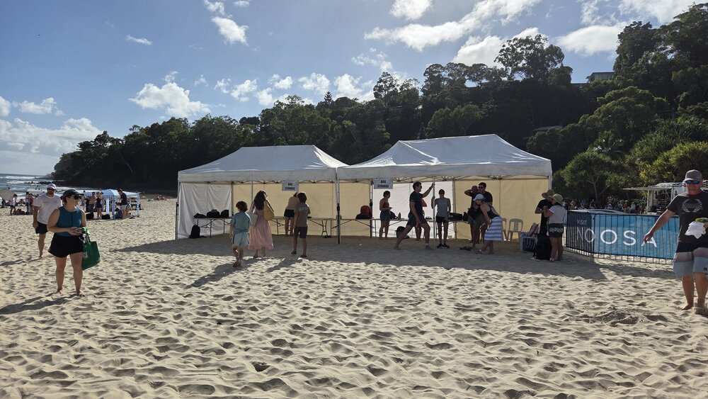 Bag storage tent, Noosa Summer Swim Festival, Noosa Main Beach, Noosa Heads, 22 February 2026