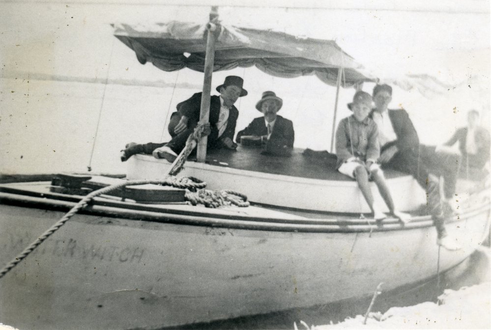 Eric Abraham, Herbert Arundell, Chas. Martin Jnr  and Claude Arundell (left to right) onboard 'Water Witch',   Tewantin, ca 1914