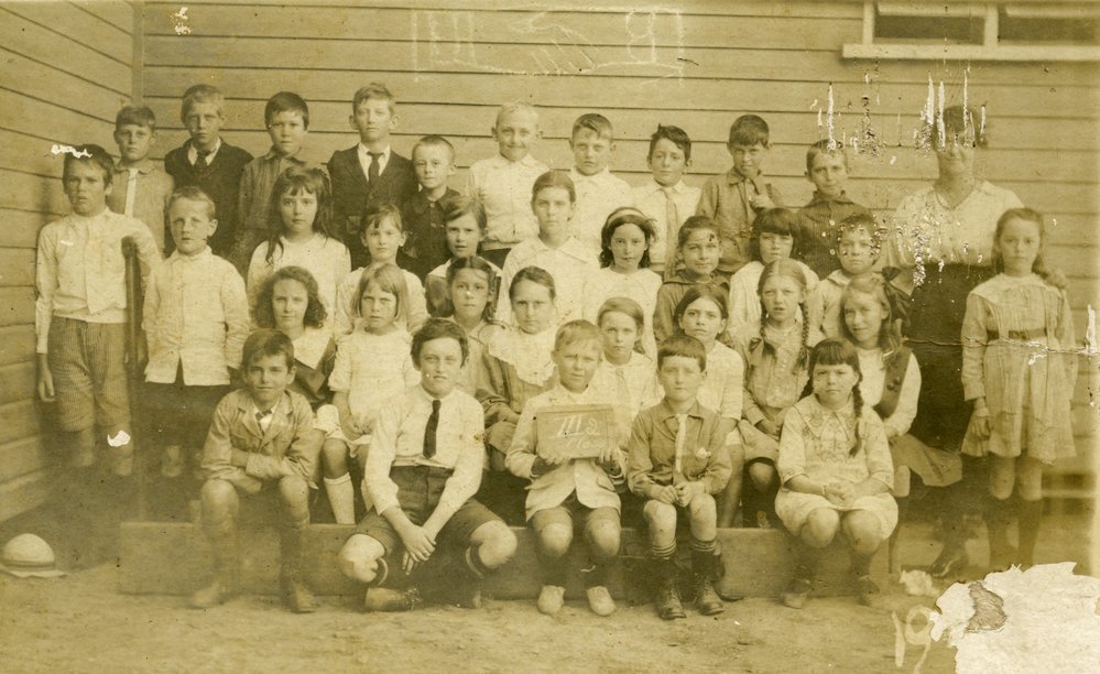 Olive Freeman (second row from front, centre of photo with white bib on dress), School Class Photo, Class III 2