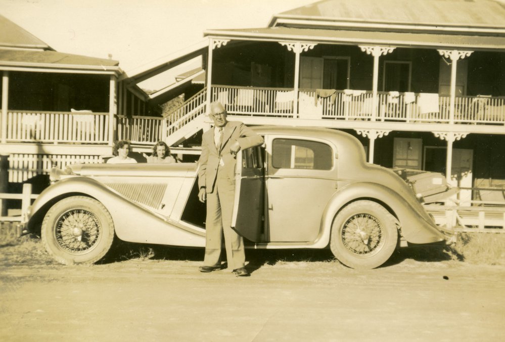 Mr Calvert and his Jaguar, Laguna House, Noosa Heads, 4 June 1949