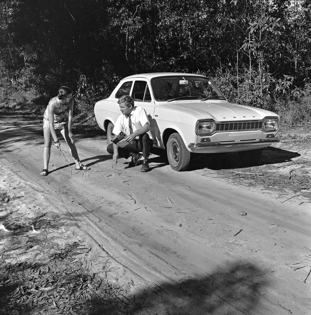 Coral Goldsworthy and Dough Partington, road testing Ford Escort, Loui Bazzo Road, Boreen Point,  May 1970