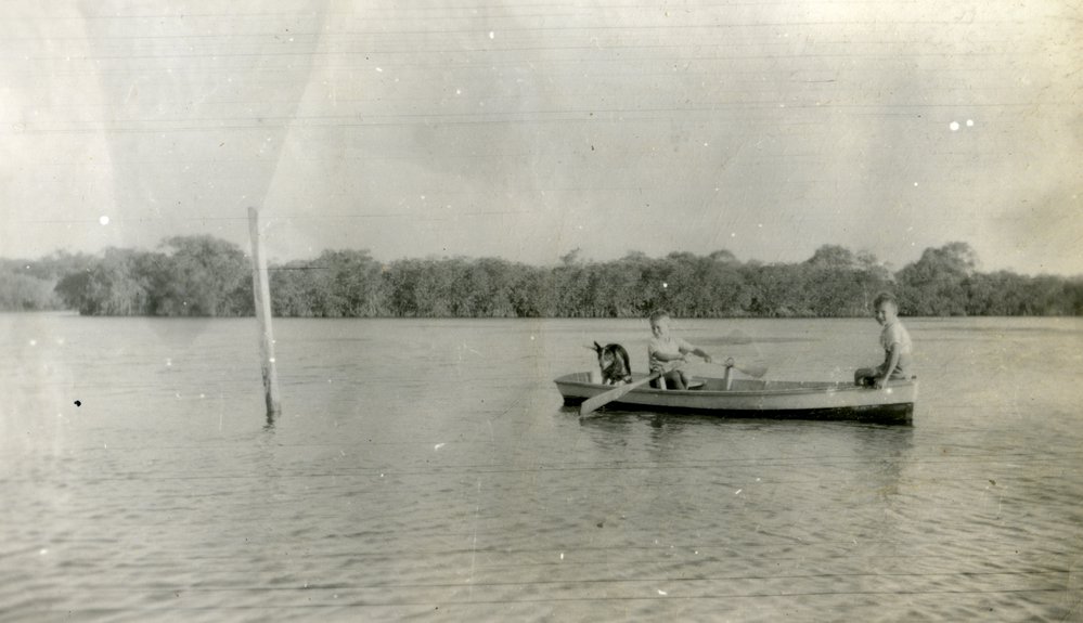 Jim Lowe with a friend and Jack (dog), Noosa River, Noosaville, 1950s