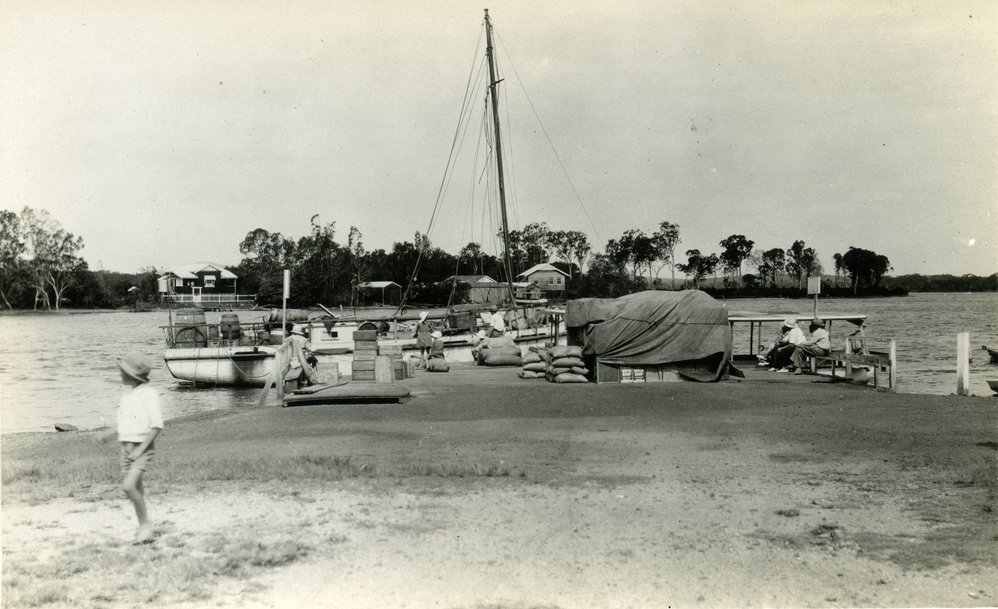 Cargo being loaded and unloaded, wharf, Tewantin