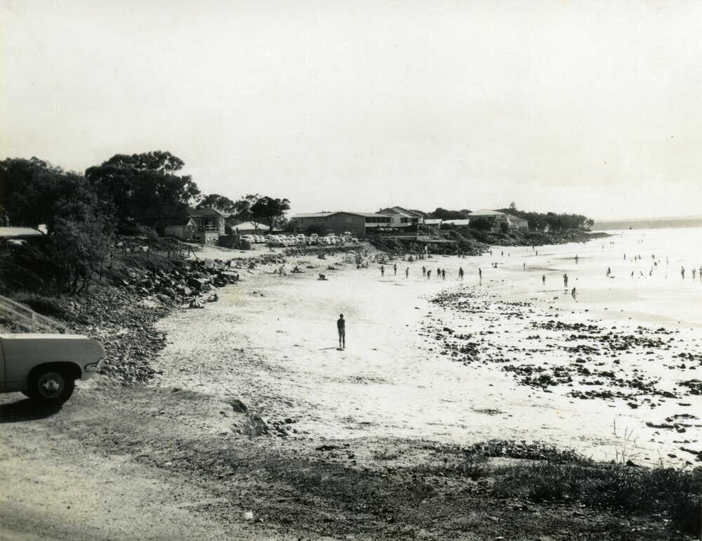 George Hay in foreground, construction, rock sea wall, Noosa Main Beach, Noosa Heads, 2 May 1969