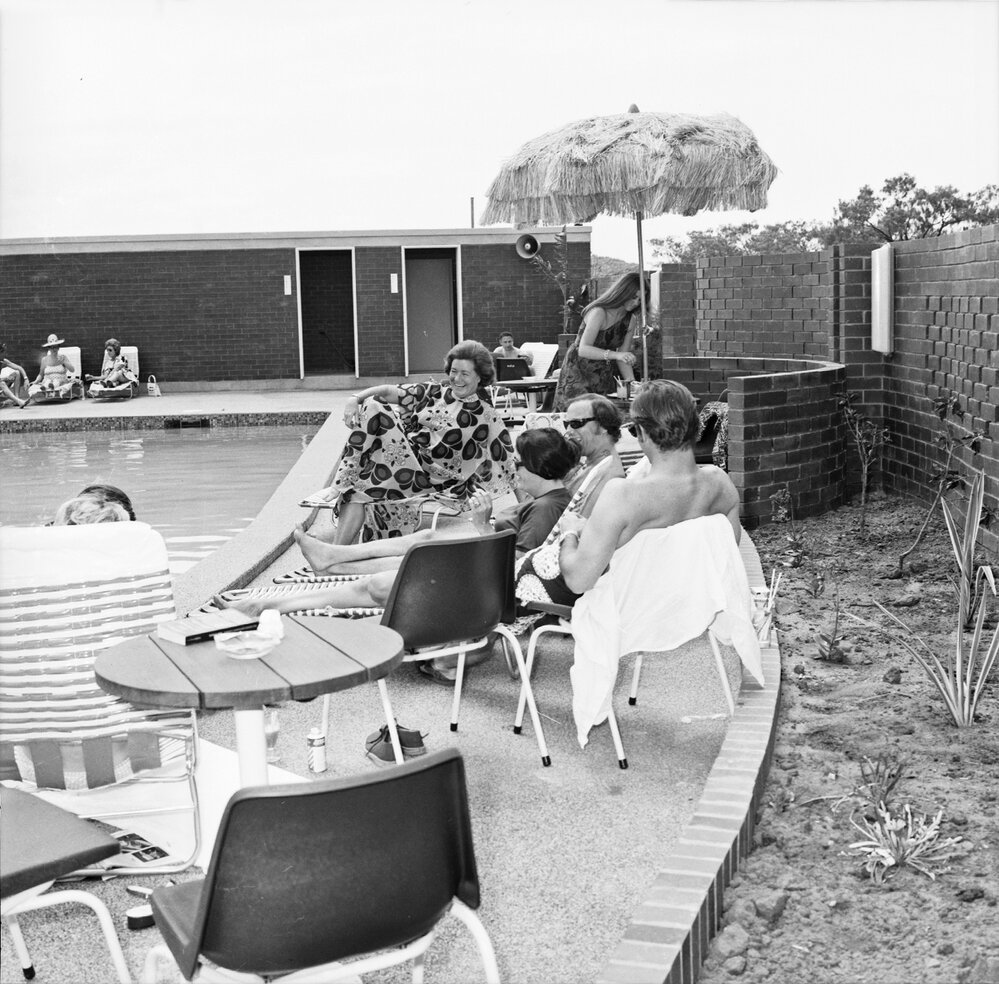 Duchess of Bedford and sunbathers poolside, Surfair International Hotel, October 1971