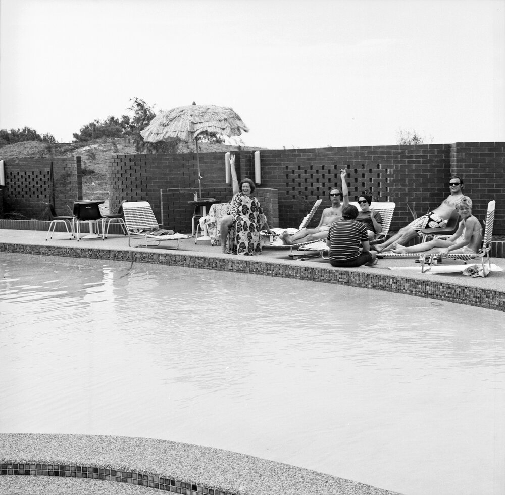 Duchess of Bedford and sunbathers poolside, Surfair International Hotel, October 1971