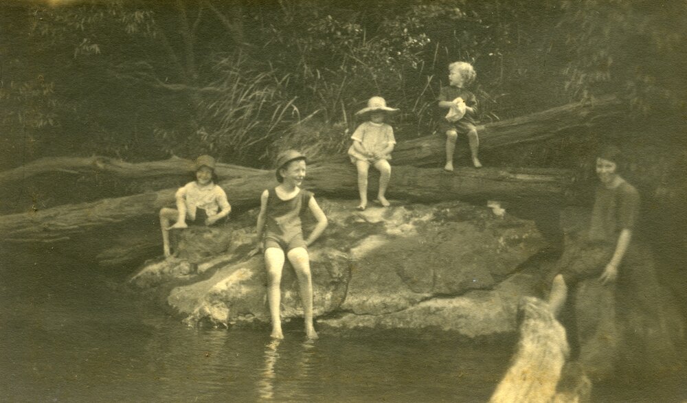 Cooling off beside the river, ca 1920s