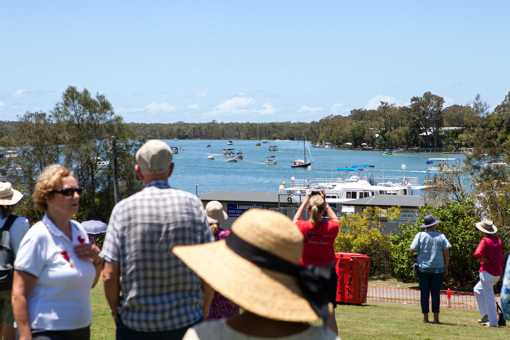 Spectators, re-enactment Peace Flotilla, Remembrance Day, Looking Forward to Peace Event, Tewantin-Noosa RSL Memorial Park, Tewantin, 11 November 2018