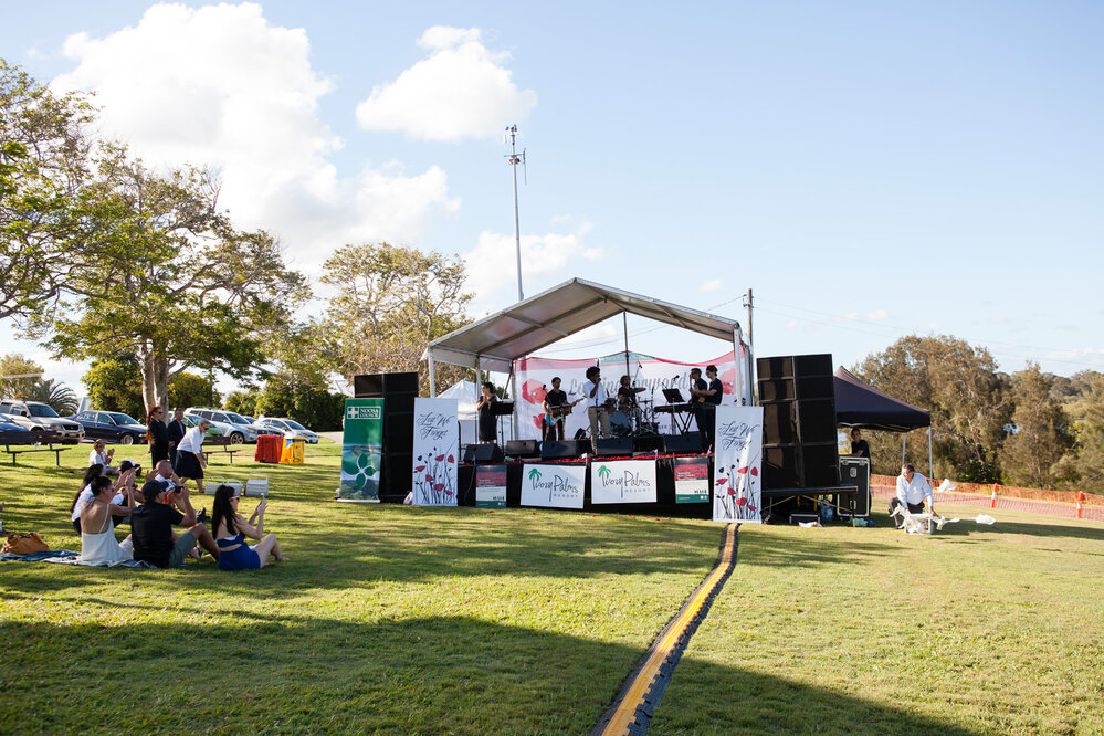 Releasing the Doves of Peace, Peter O'Toole, White Doves of Noosa (bottom right), Kimberly Hodgson (left on stage), Lai Utovou (centre on stage) and Band Members, Remembrance Day, Looking Forward to Peace Event, Tewantin-Noosa RSL Memorial Park, Tewantin,