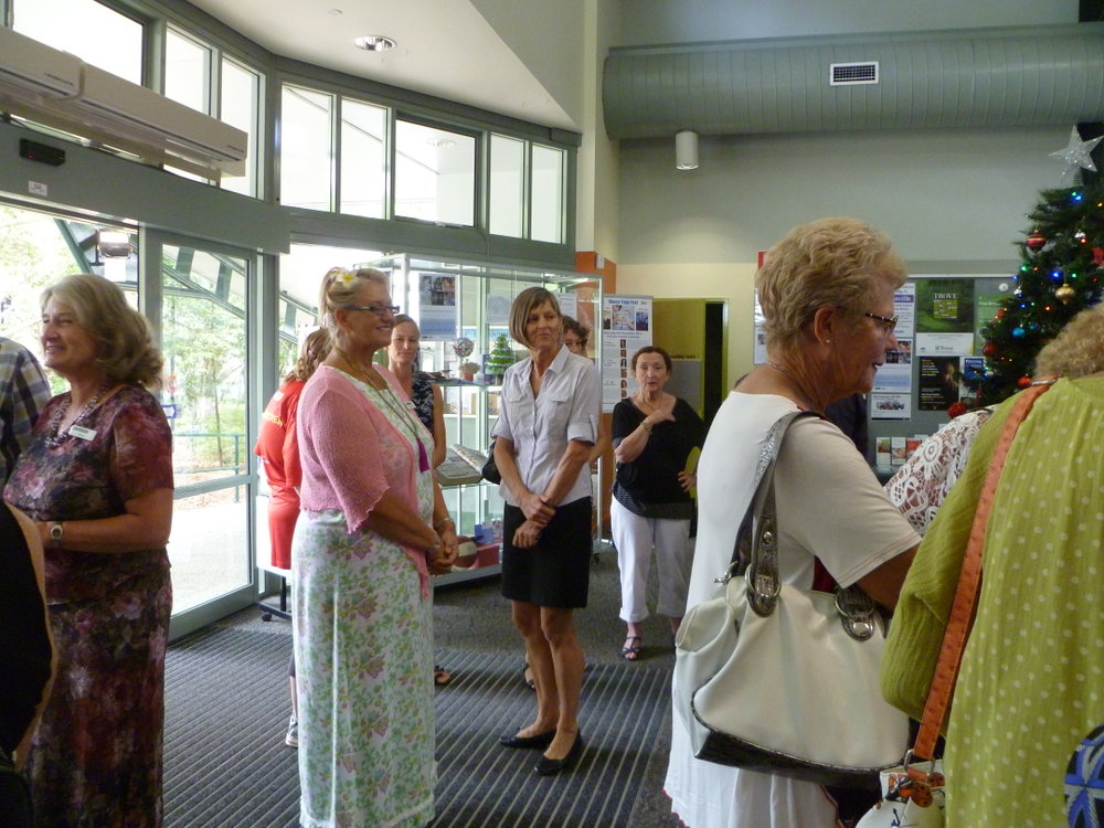 Nadia Bowtell (left, Librarian Cooroy Library) and guests, Wallace Park Precinct 21st Birthday Celebrations, Noosaville Library, Wallace Park, Noosaville, 4 December 2014