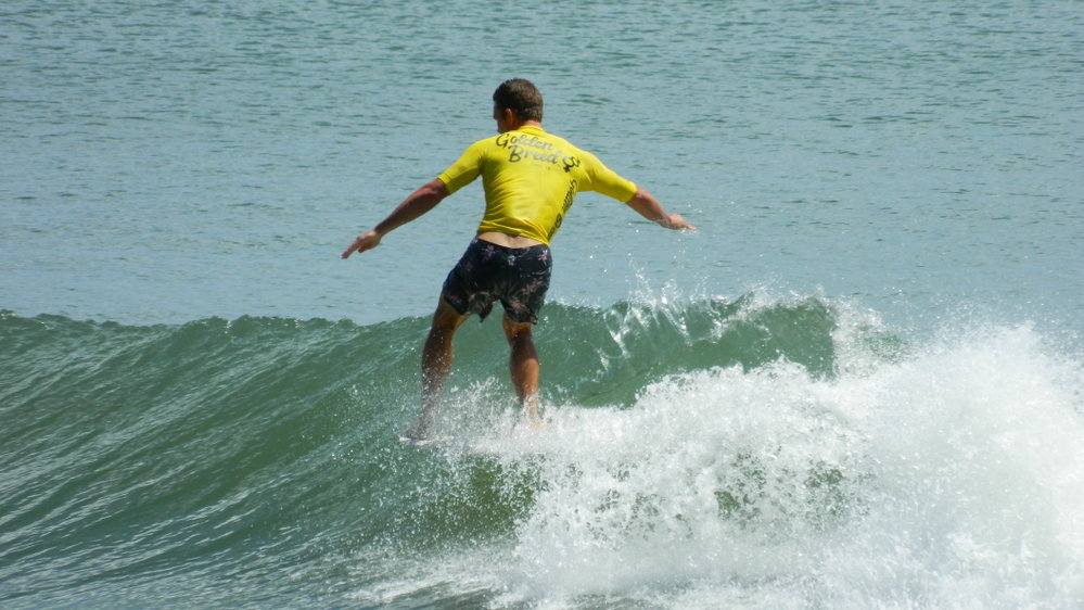 Competitor, Noosa Festival of Surfing, Noosa Main Beach, Noosa Heads, 14 March 2013