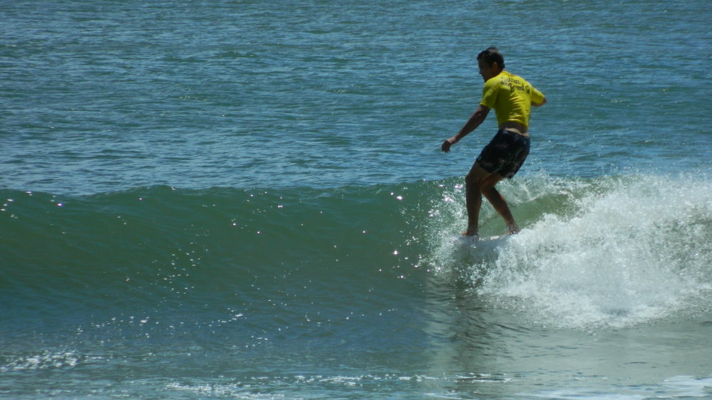 Competitor, Noosa Festival of Surfing, Noosa Main Beach, Noosa Heads, 14 March 2013