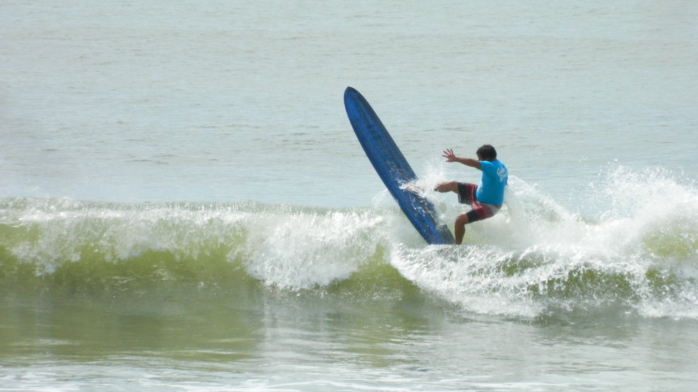 Competitor, Noosa Festival of Surfing, Noosa Main Beach, Noosa Heads, 14 March 2013
