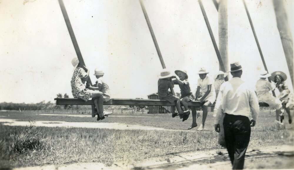Ted Lowe on swing, Munna Point, Noosaville, 1939
