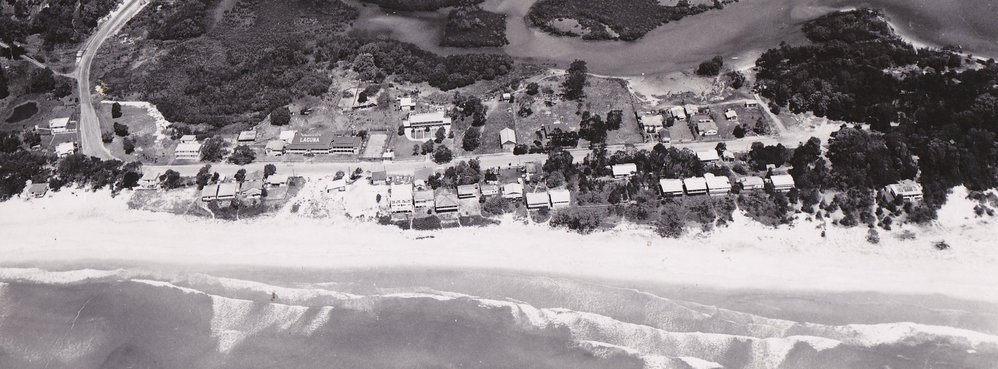 Aerial view Noosa Main Beach and Hastings Street, Noosa Heads, ca 1950s