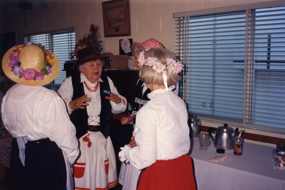 Yvonne Brinsmead (facing front) with (l-r) Jocelyn (unknown), Isobel Lawes and Marcia Dorricott, Austrian dress-up, International Study of Austria, QCWA Tewantin Noosa Branch Hall, Tewantin, 1995