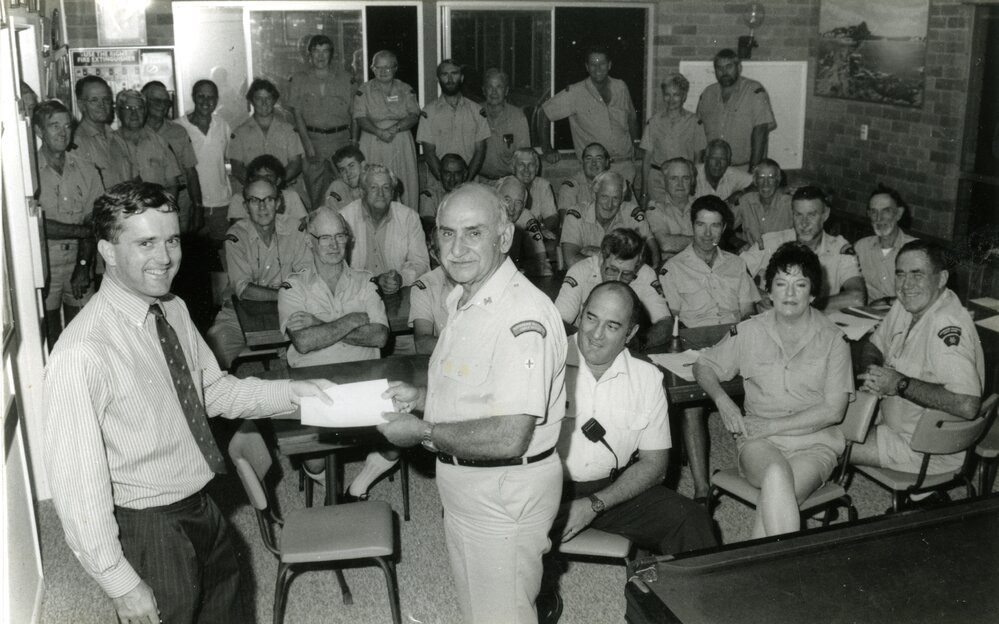 Receiving contributions, Coast Guard Noosa QF5, Noosaville, 1980s