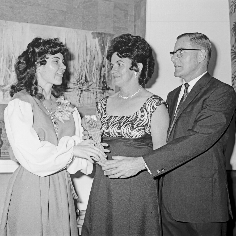 Roslyn Vanderwolf and parents, Gazebo Room, Boolarong Motel, Alexandra Headlands, September 1973
