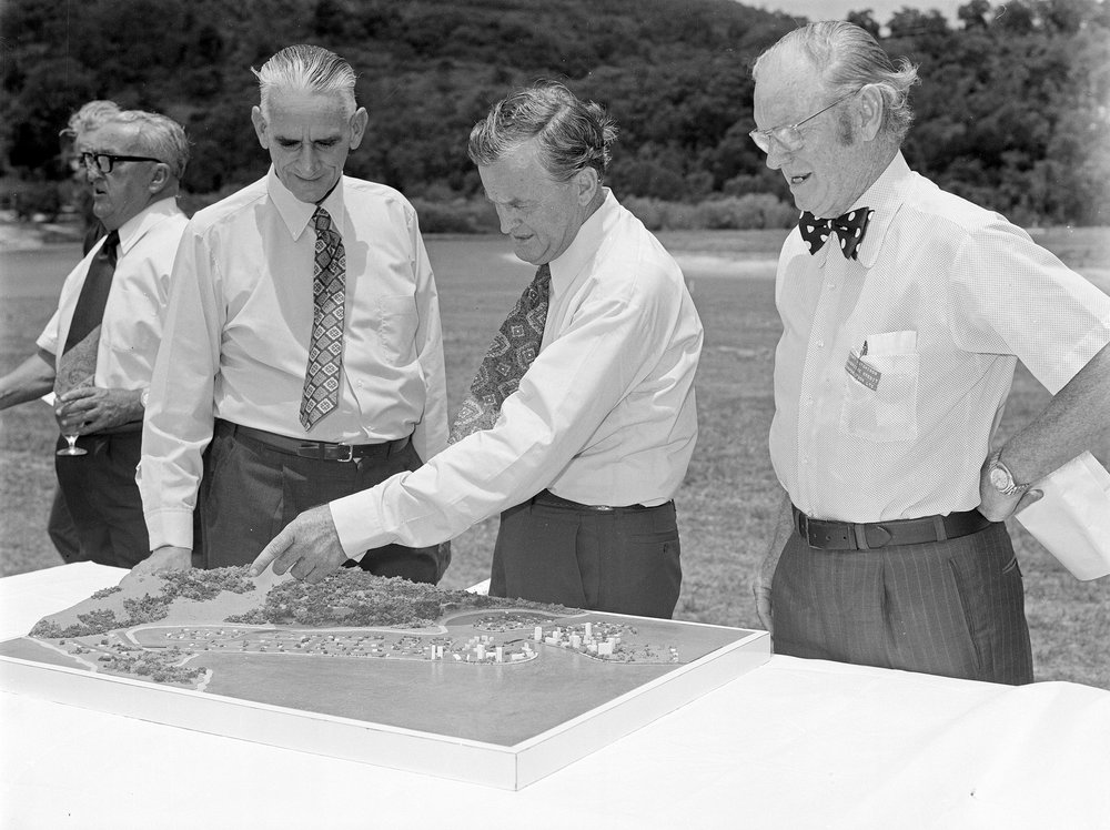 Premier Joh Bjelke-Petersen examines model of Noosa Sound Development, 18 December 1973 