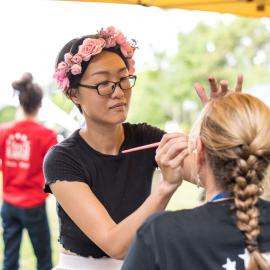 Face painting by Elaine Shen from Waterlily Face Painting, Hinterland Adventure Playground, Marara Street, Cooroy, 6 May 2022