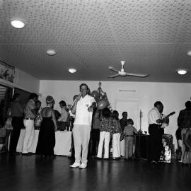 David Gordon and  partygoers, Christmas party, Lakes Motor Inn restaurant, Tewantin, 1 December 1972