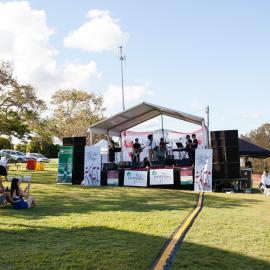 Releasing the Doves of Peace, Peter O'Toole, White Doves of Noosa (bottom right), Kimberly Hodgson (left on stage), Lai Utovou (centre on stage) and Band Members, Remembrance Day, Looking Forward to Peace Event, Tewantin-Noosa RSL Memorial Park, Tewantin,