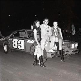 Driver and promo girls, Sunshine Coast Speedway, Wappa Falls Road, Yandina, July 1973