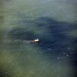 Aerial view, Tugboat, 'William R. Golding', waiting for salvage attempt, off Teewah Beach, Noosa North Shore, July 1973