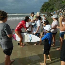 Competitor and crowds, Noosa Festival of Surfing, Noosa Main Beach, Noosa Heads, 10 March 2013