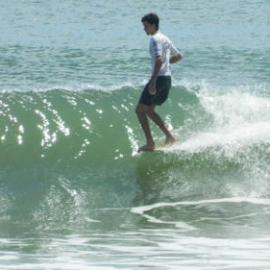Competitor, Noosa Festival of Surfing, Noosa Main Beach, Noosa Heads, 14 March 2013