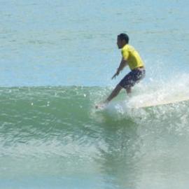 Competitor, Noosa Festival of Surfing, Noosa Main Beach, Noosa Heads, 14 March 2013