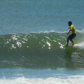 Competitor, Noosa Festival of Surfing, Noosa Main Beach, Noosa Heads, 14 March 2013