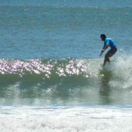 Competitor, Noosa Festival of Surfing, Noosa Main Beach, Noosa Heads, 14 March 2013