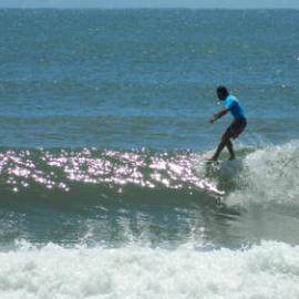 Competitor, Noosa Festival of Surfing, Noosa Main Beach, Noosa Heads, 14 March 2013
